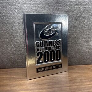 Vintage Guinness Book Of World Records 2000 Millennium Edition Silver Hard Cover